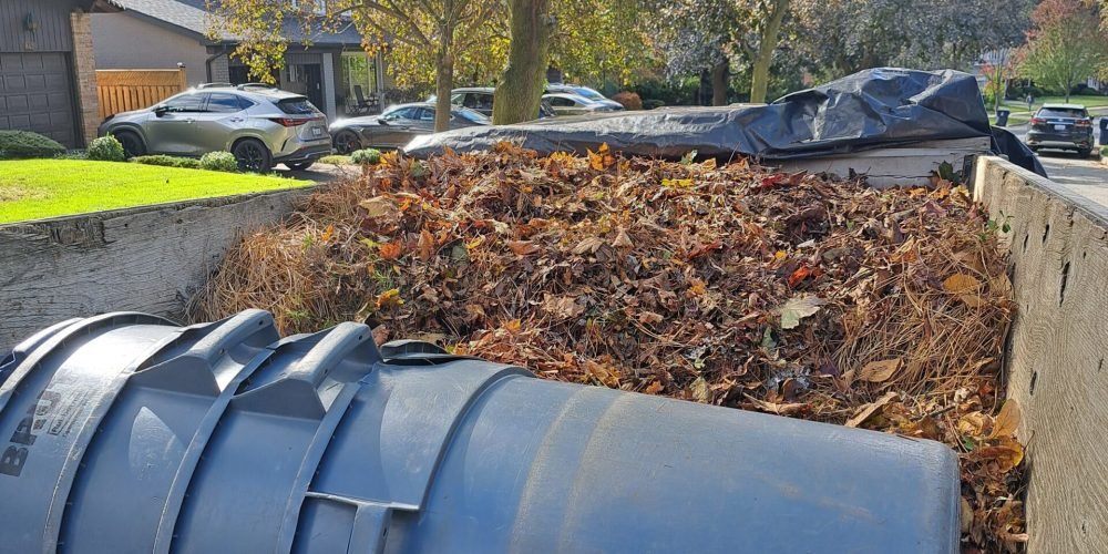 An image of fall leaves and debris collected by Framptons Property Services Fall Cleanup Program.